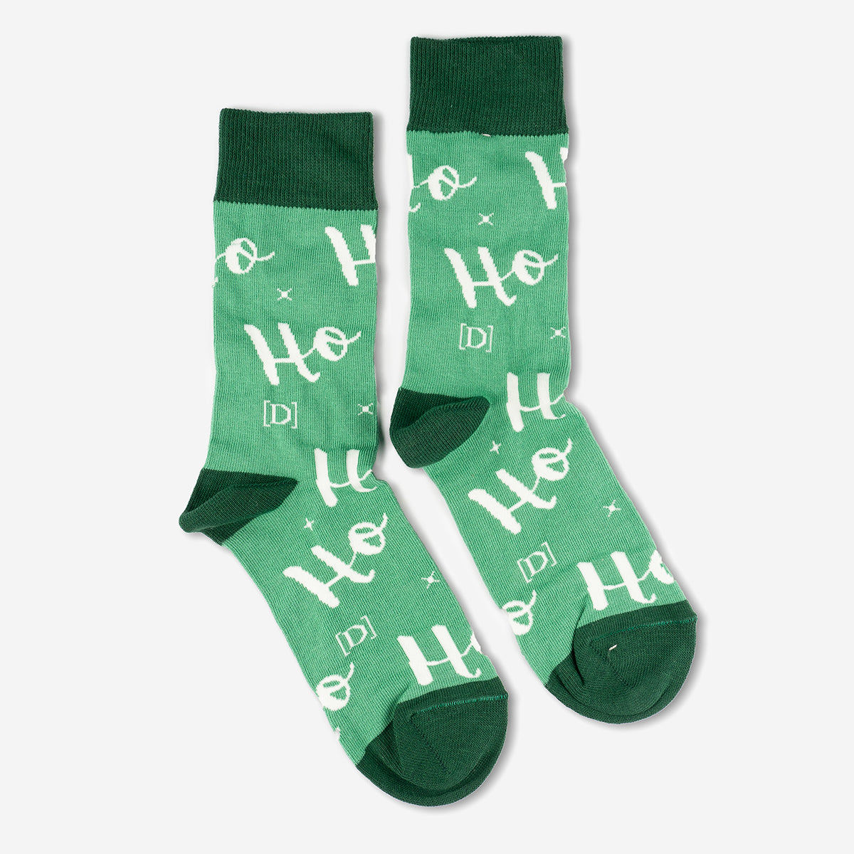 Green socks with ho ho ho writing on them