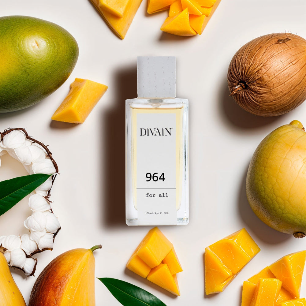 Perfume divain-964 surrounded by its olfactory notes such as mango and pear.