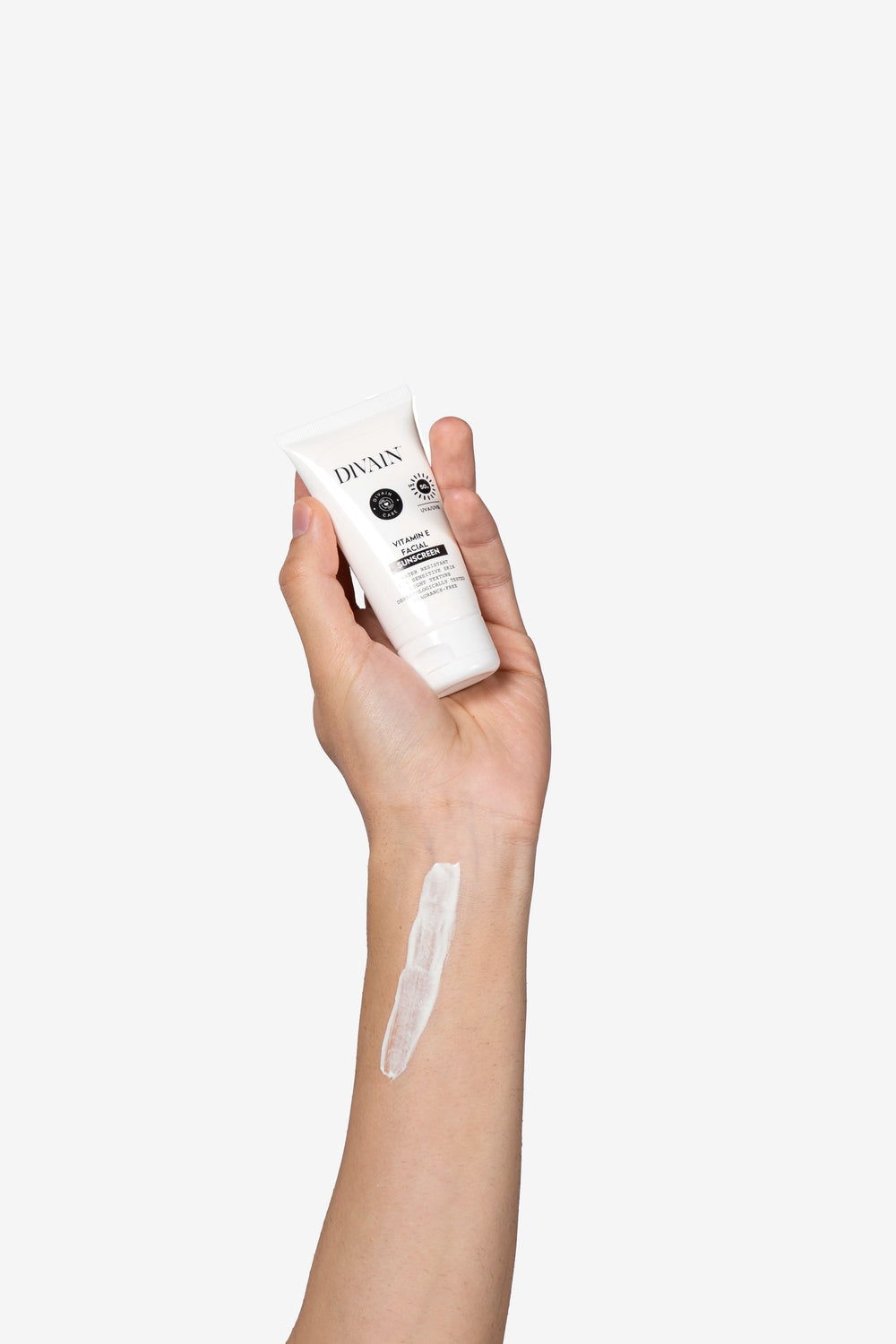 A hand showing the face cream